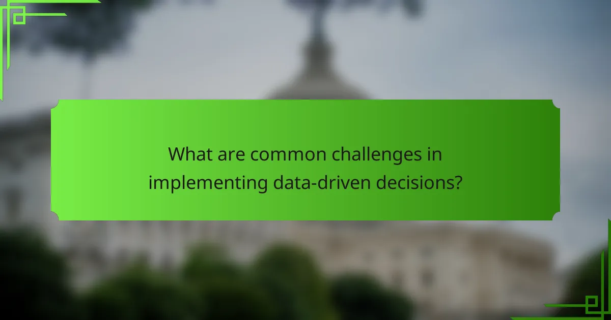 What are common challenges in implementing data-driven decisions?